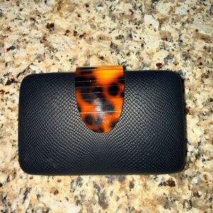 Elegant Black Clutch with Tortoiseshell Accent